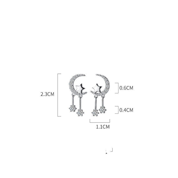 Boucle d'oreille lune strass étoile diamants pendants - Élégance céleste avec une lune ornée de strass et une étoile brillante, suspendues à des diamants de zirconium. Parfait pour une touche sophistiquée.