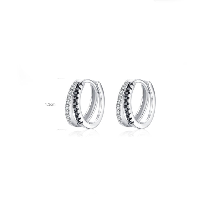 Boucle d'oreille créole double anneau strass - Femme - Argent 925. Élégantes boucles d'oreilles en argent ornées de strass noirs et transparents, offrant une touche raffinée et tendance à toute tenue.