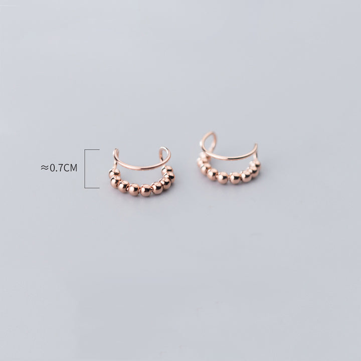 Boucle d'oreille cartilage sans trou, double anneau perle métallique - Femme - Argent 925. Élégance et innovation réunies dans ces boucles d'oreille en argent 925.