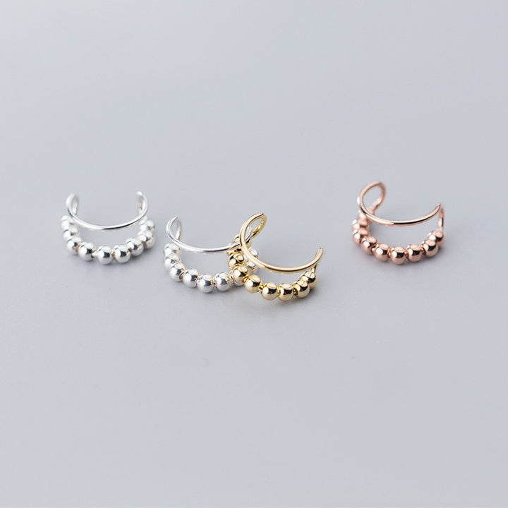 Boucles d'oreille cartilage sans trou, double anneau perle métallique - Femme - Argent 925. Élégance et innovation réinventées avec ces bijoux en argent 925.