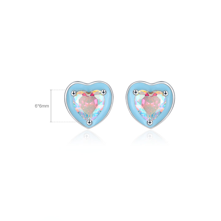 Boucle d'oreille coeur bleu diamant bleu rose en argent 925 - Femme. Élégantes boucles d'oreille en forme de coeur avec un magnifique zirconium aux teintes de bleu et de rose.