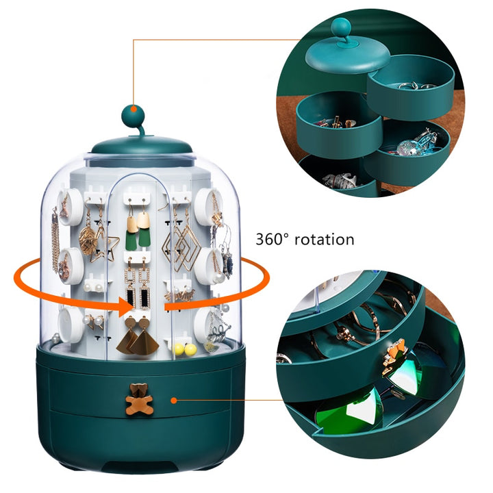 Un présentoir rotatif à 360° pour boucles d'oreille avec boîte de rangement. Admirez vos bijoux grâce à son compartiment transparent et ses tiroirs charmants. Élégant, fonctionnel avec une touche de charme.