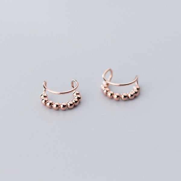 Une paire de boucles d'oreille cartilage sans trou avec double anneau et perle métallique en argent 925 - Femme - 1001 Boucles d'Oreille