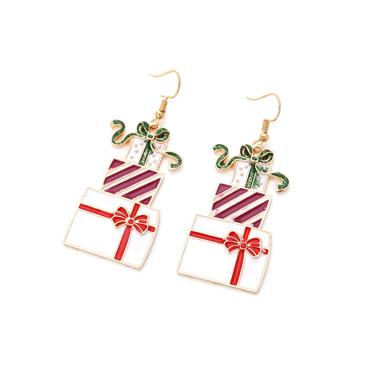 Boucle d'oreille pendante noël paquets cadeaux - Femme : des boucles d'oreille en acier inoxydable plaqué or avec trois paquets-cadeaux empilés, ajoutant une note festive à votre look de Noël. Dimensions : 6,2 x 2,5 cm.