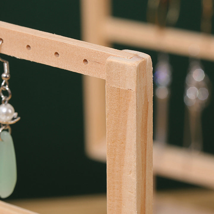Présentoir en bois rectangulaire pour boucles d'oreille, design minimaliste. Mettez en valeur et organisez vos bijoux avec élégance et simplicité.