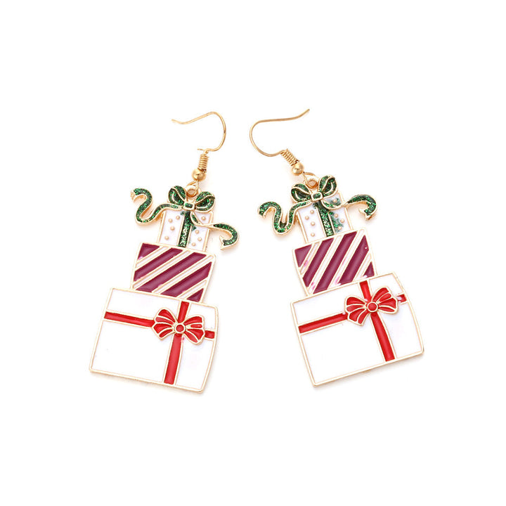 Boucle d'oreille pendante noël paquets cadeaux - Femme, trois paquets-cadeaux empilés en acier inoxydable plaqué or, ajoutent une note festive à votre look de Noël.