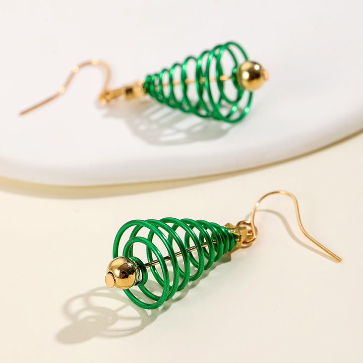 Une paire de boucles d'oreille pendantes avec une spirale verte en forme de sapin de Noël et une étoile dorée - Femme.